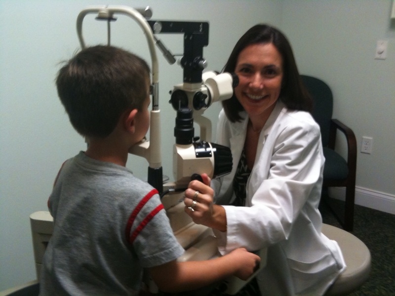 Dr Wilgers at microscope